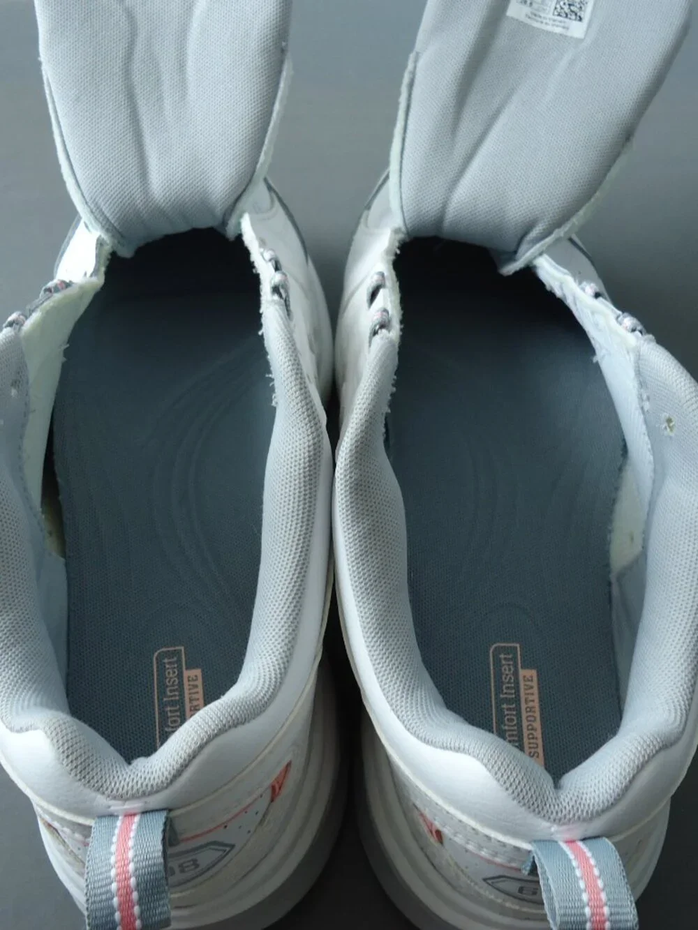 SIZE 9.5. D. New Balance women's white leather sneakers shoes.
